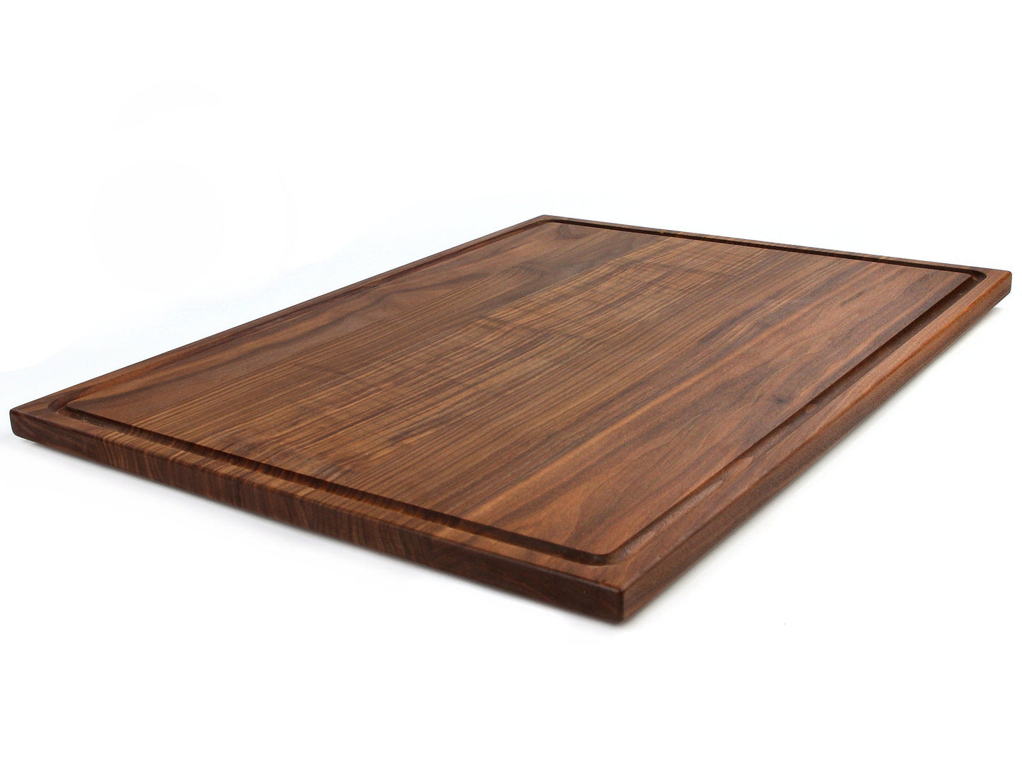 Wooden cutting board on a white background