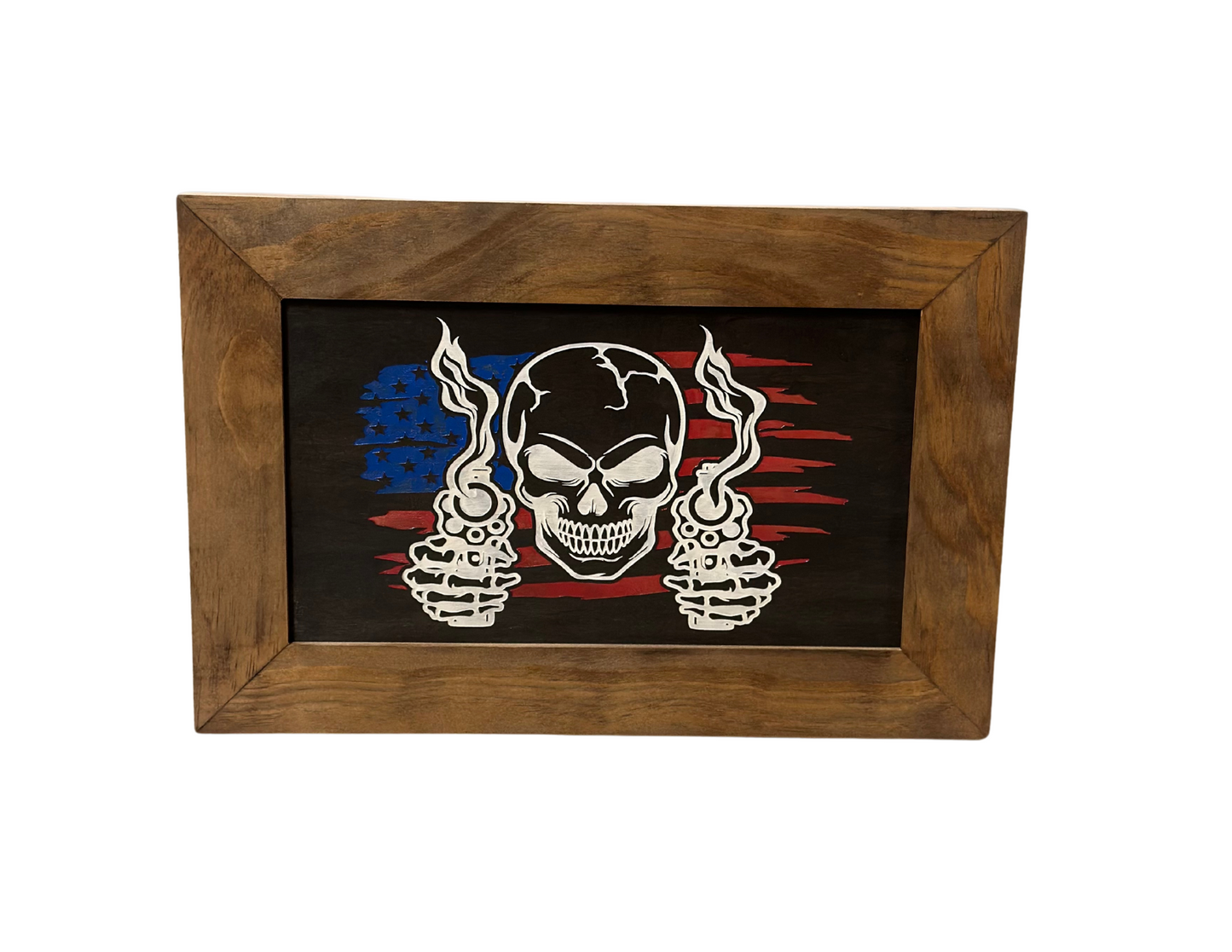 Wooden-framed artwork with a skull design and American flag colors on a black background.