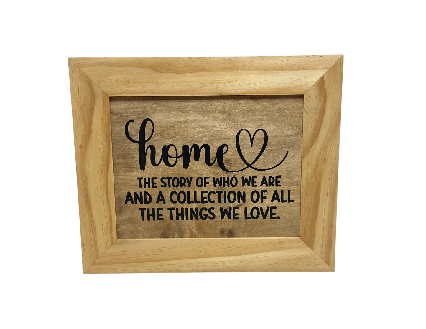 Wooden frame with engraved text on a white background