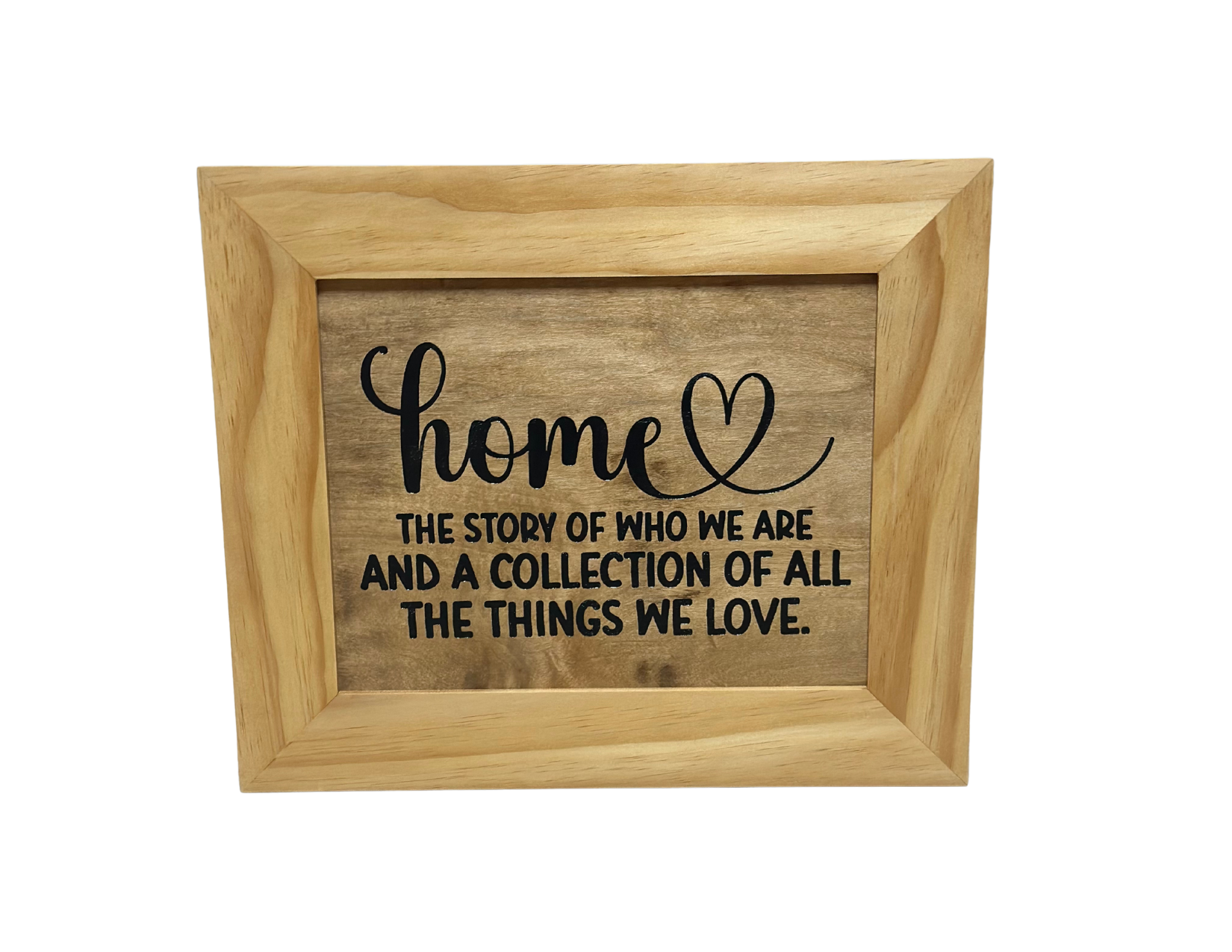 Wooden frame with engraved text on a white background