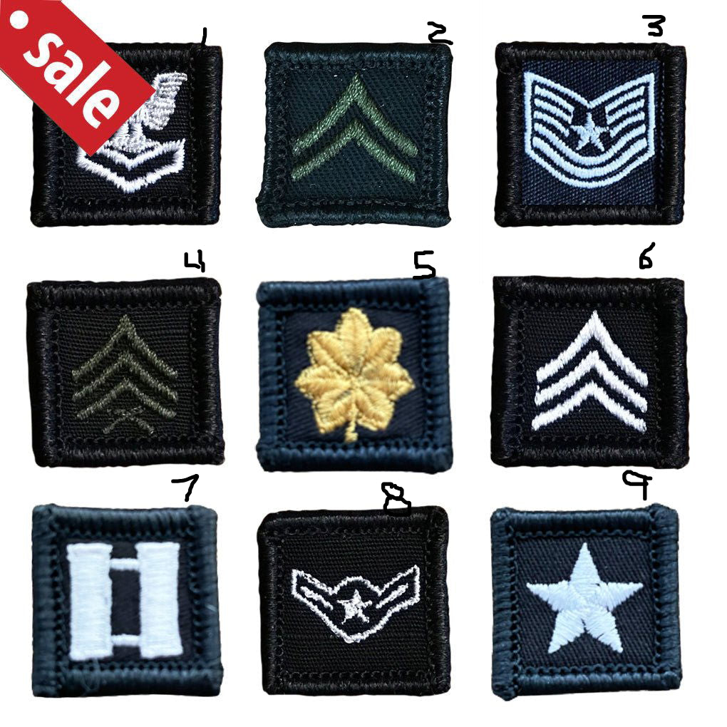Collection of military rank insignias on a white background with a sale label.