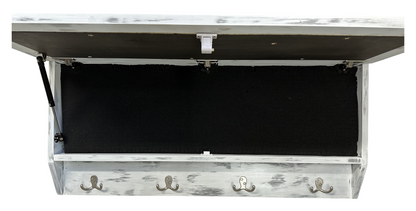 Wooden bench with a black cushion and coat hooks on a white background