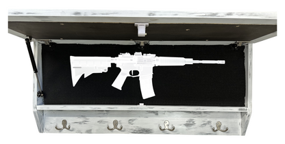 Hidden gun storage compartment in a piece of furniture with a rifle silhouette.