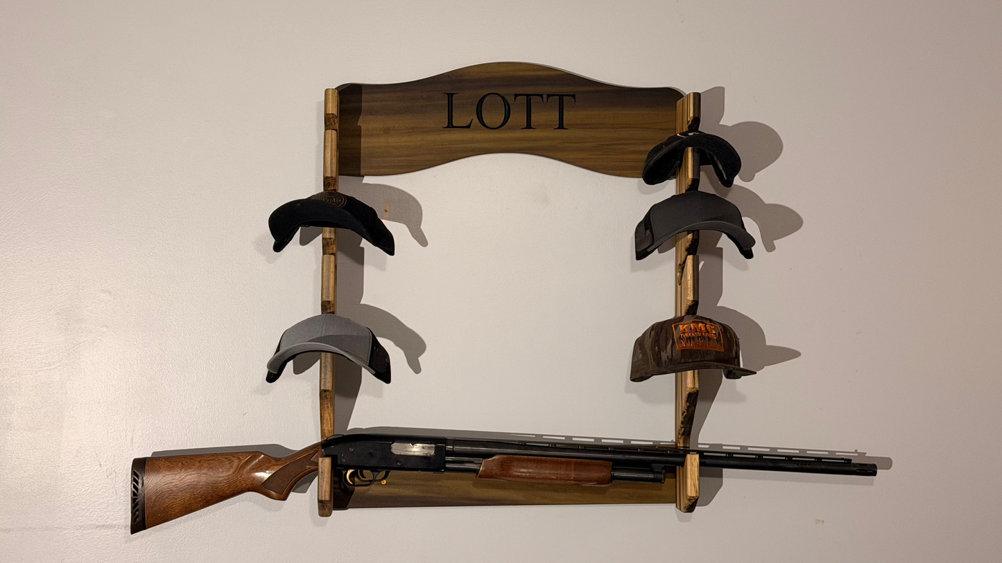Wooden gun rack with hats and a rifle on a plain background