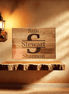 Personalized oak cutting board with walnut inlay and engraved family name — Hooyah Woodworks