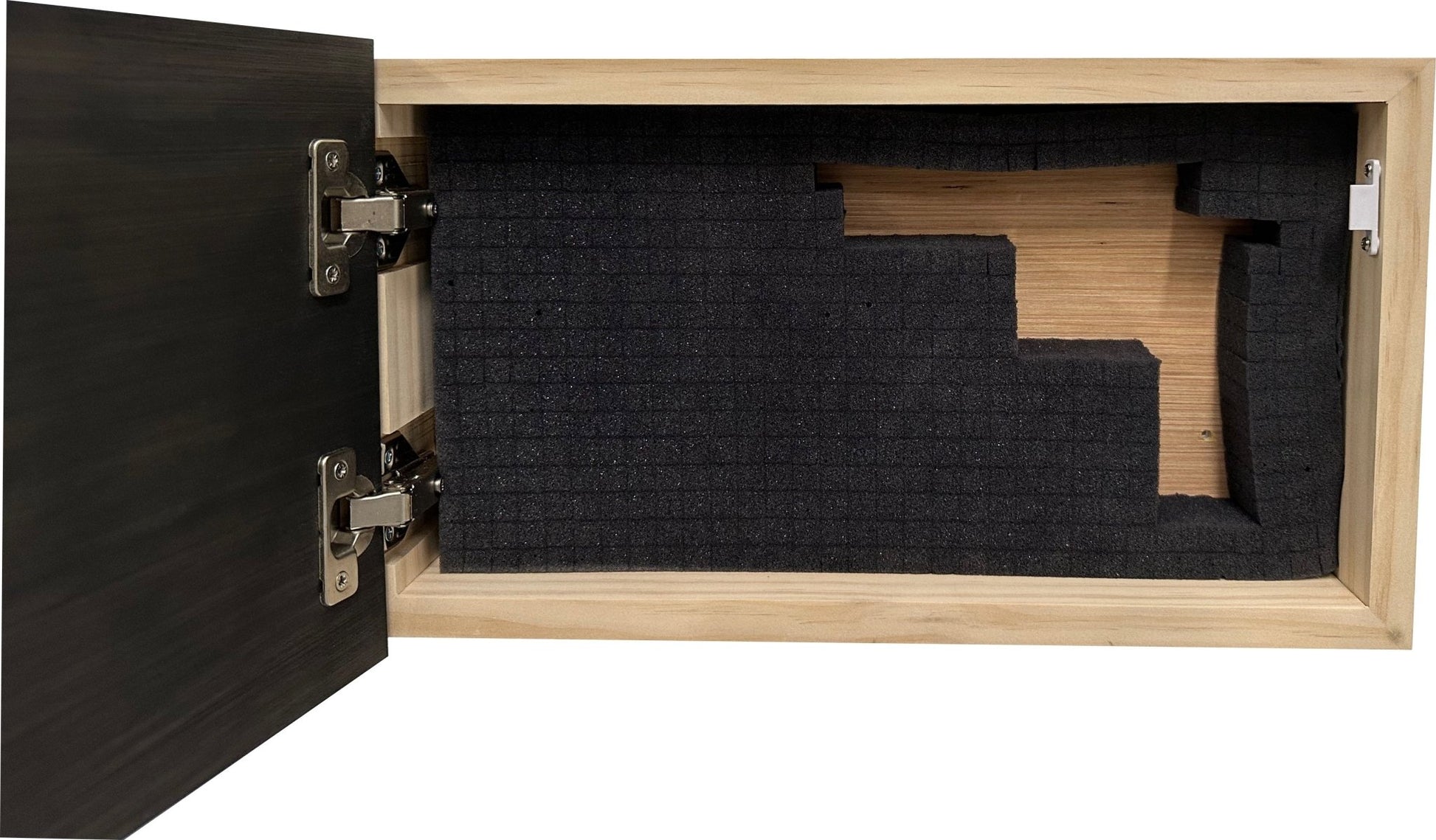Wooden box with black foam inserts on a white background