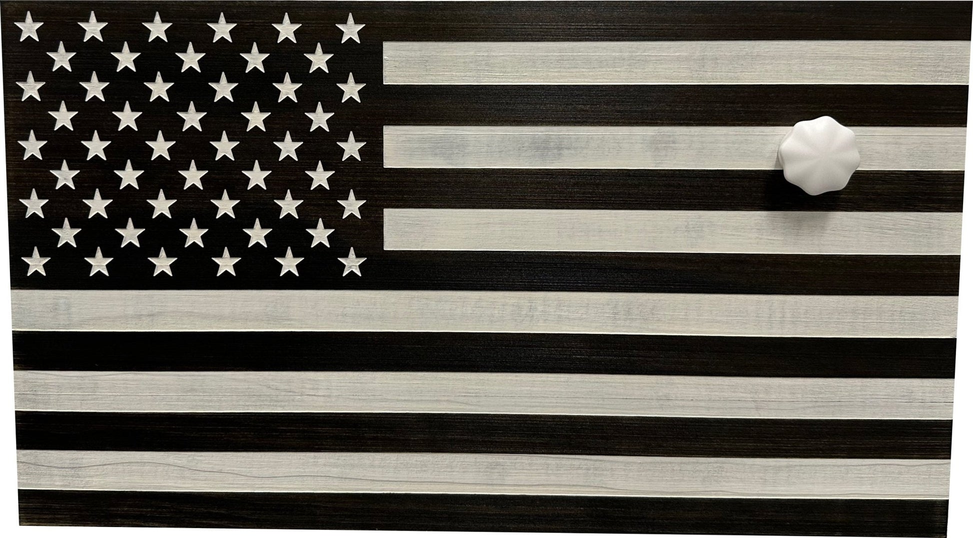 Wooden American flag with a white dot on a black background