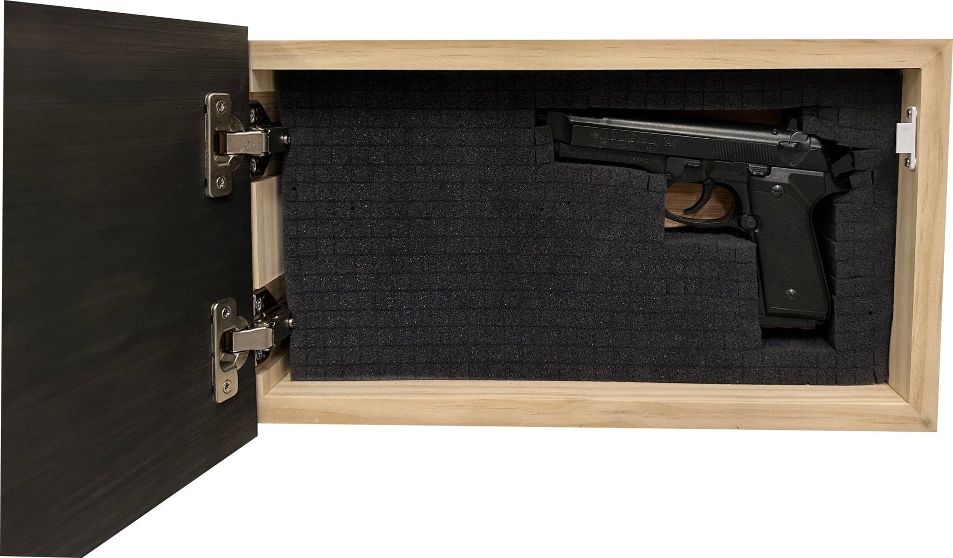 Handgun inside a wooden gun safe with black interior.