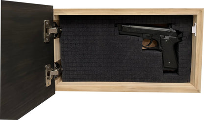 Handgun inside a wooden gun safe with black interior.