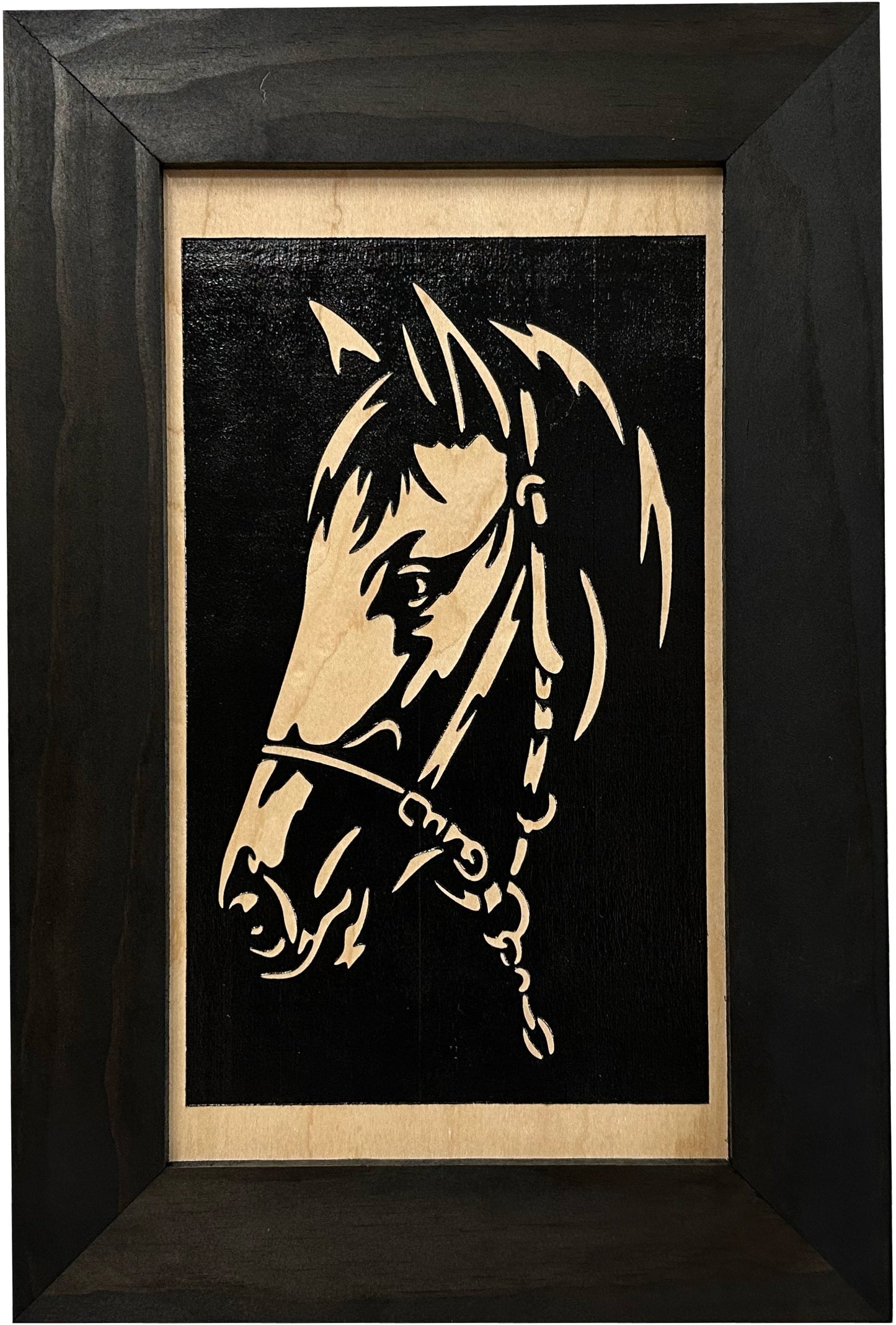 Framed artwork of a horse's head on a black background
