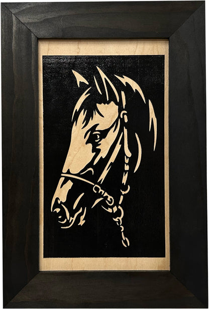 Framed artwork of a horse's head on a black background
