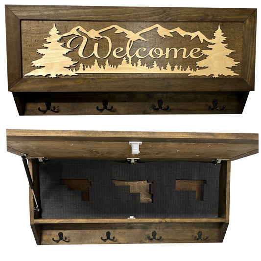 Wooden wall-mounted storage bench with 'Welcome' and mountain design, featuring coat hooks.