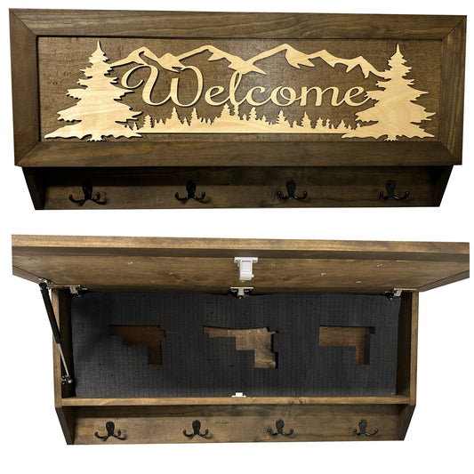 Wooden wall-mounted storage bench with 'Welcome' and mountain design, featuring coat hooks.