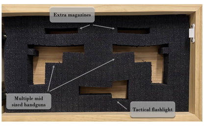 Wooden gun case with foam interior labeled for storage of extra magazines, mid-sized handguns, and a tactical flashlight.