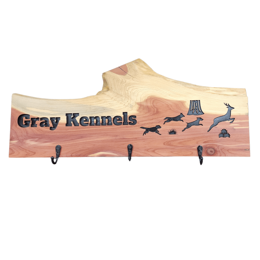 Dog GPS collar charging station made from a red cedar board