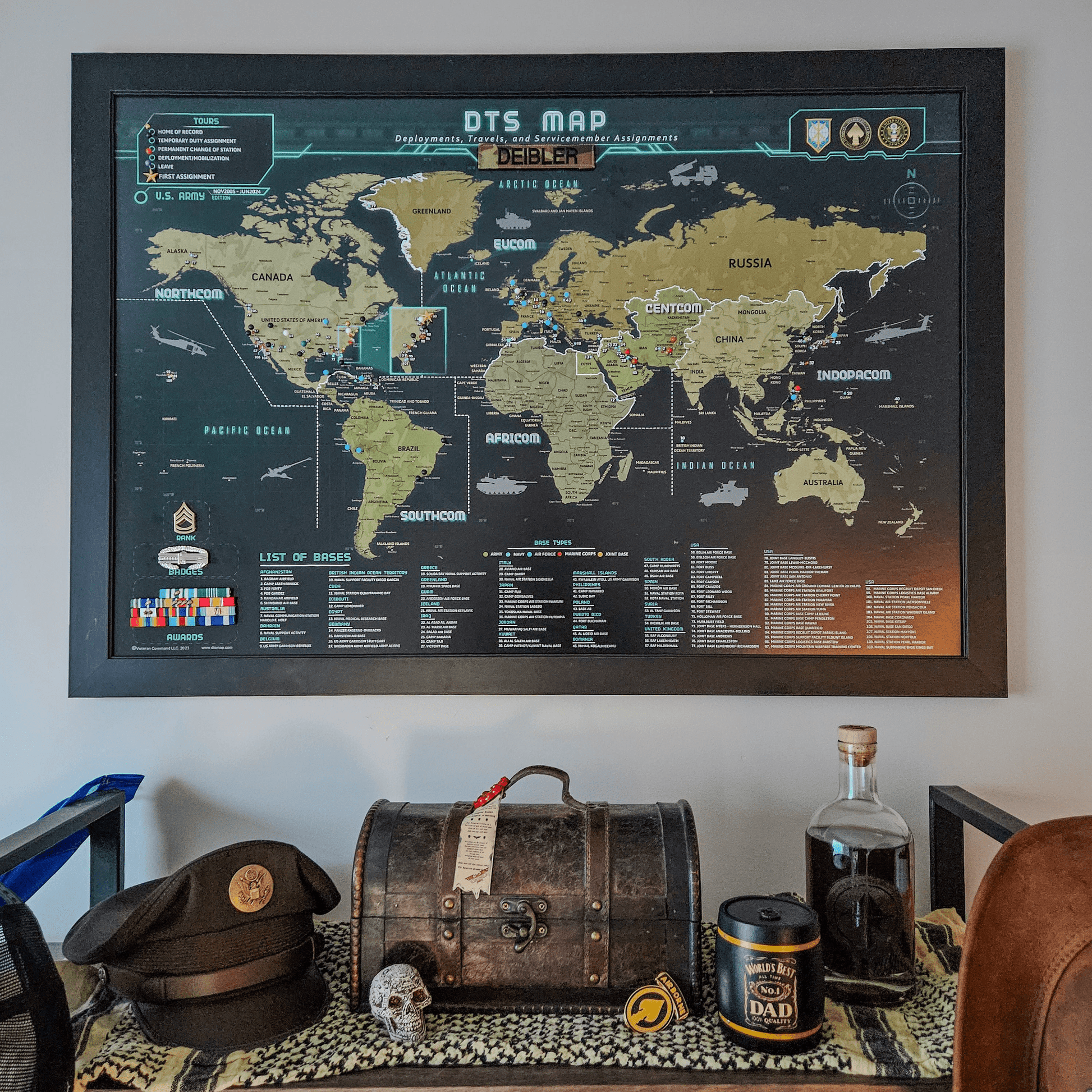 World map poster on a wall with decorative items below