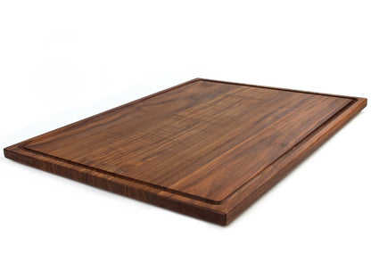 Wooden cutting board on a white background