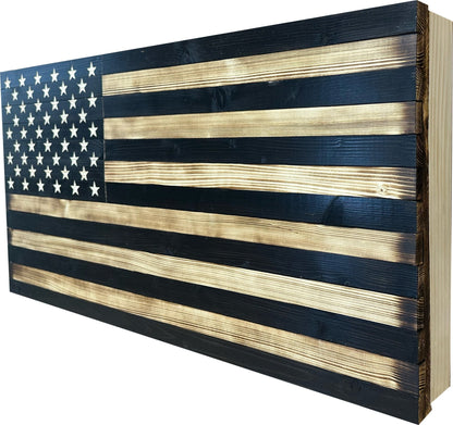 Wooden American flag with dark blue and light brown stripes on a white background