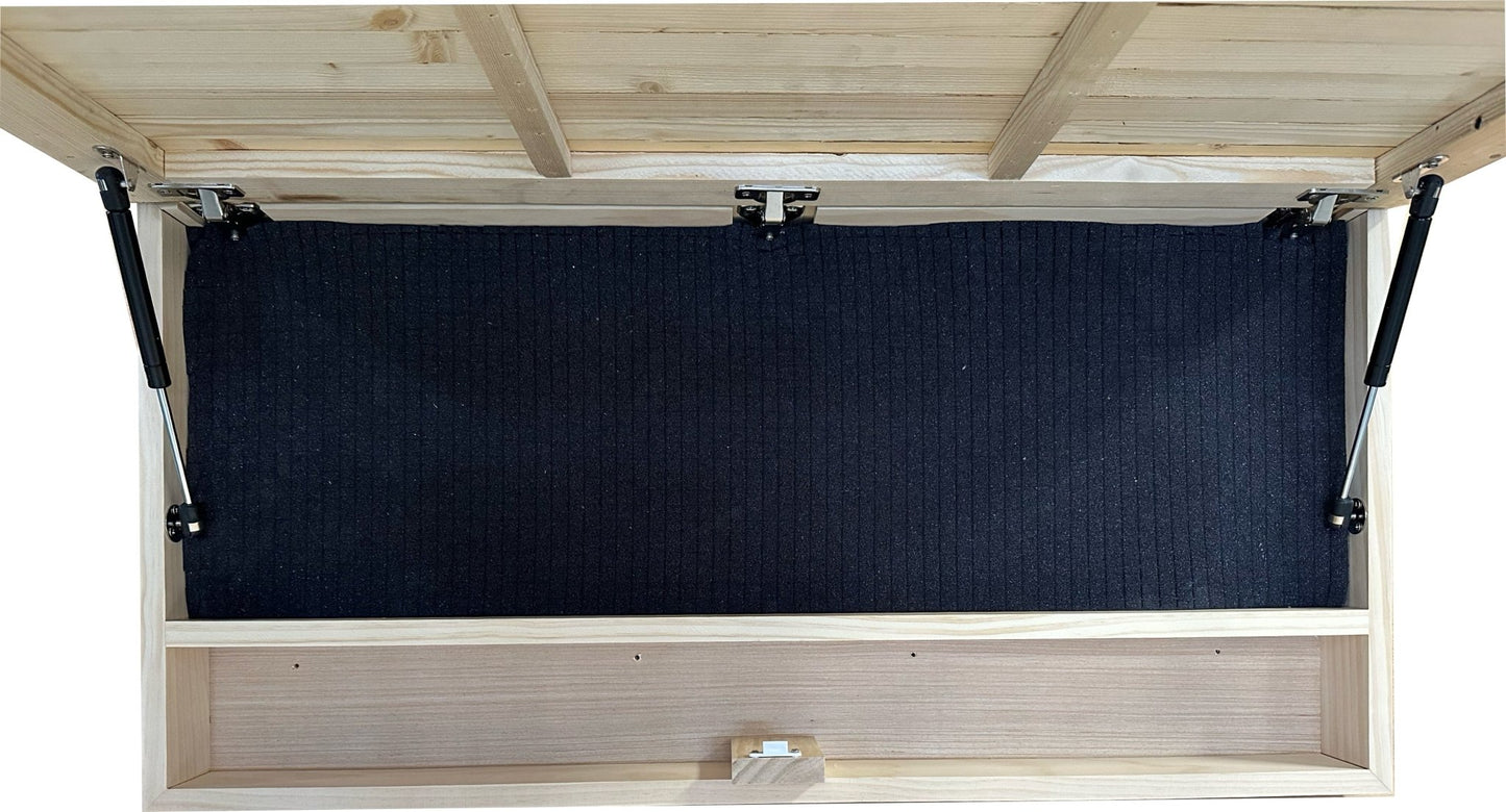 Wooden storage shed with a black roller shutter door open