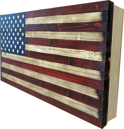 Wooden American flag with a rustic finish on a white background