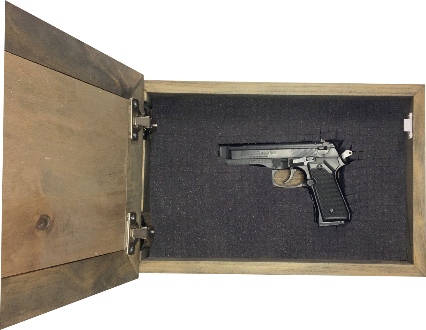 Silver gun inside an open wooden box with a black interior