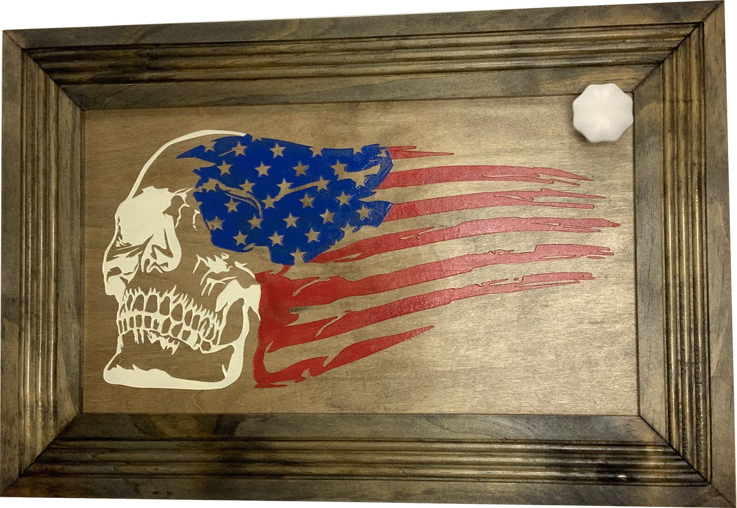 Wooden plaque with a skull and American flag design on a wooden frame.